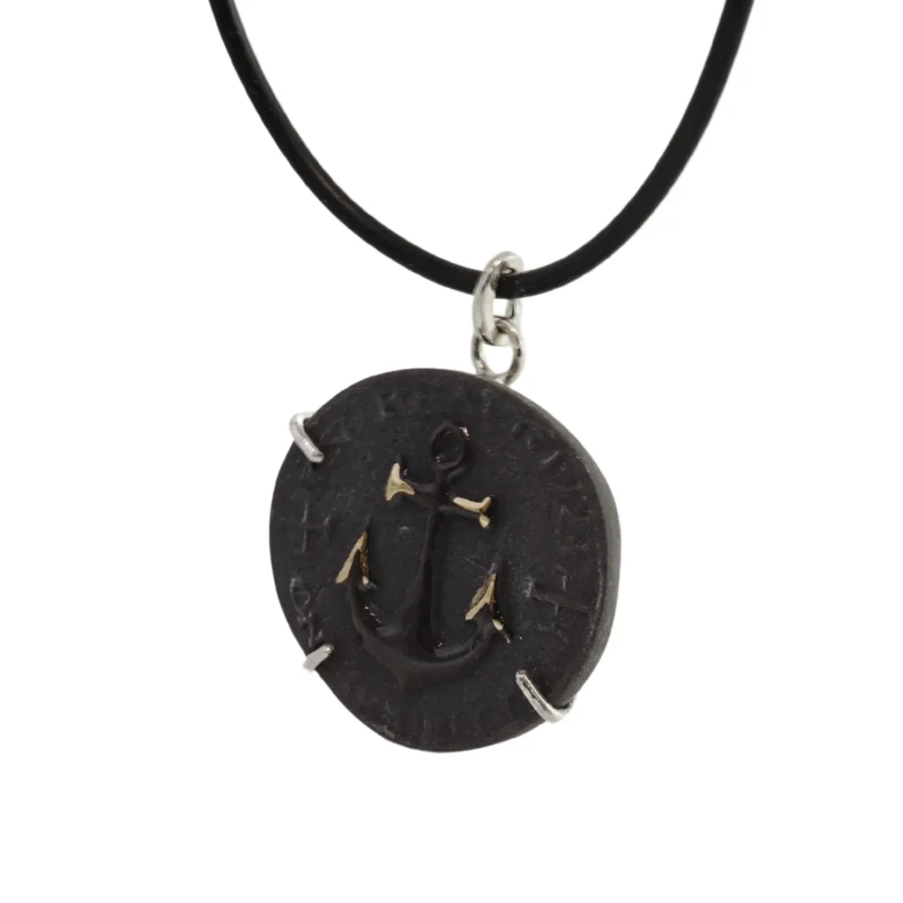 Pakabukas-sekmes-moneta Pakabukas-sekmes-moneta